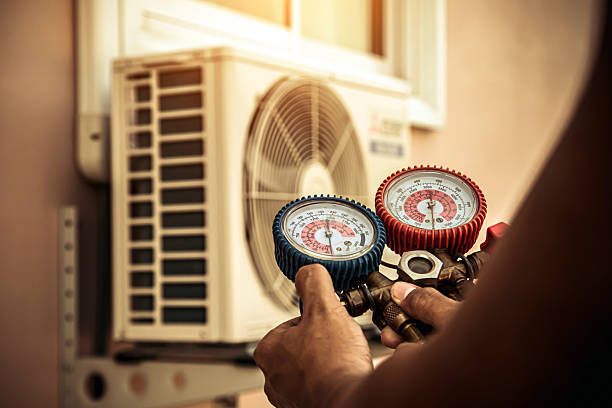 Professional Ductwork Repair technician working in Bloomington, IL